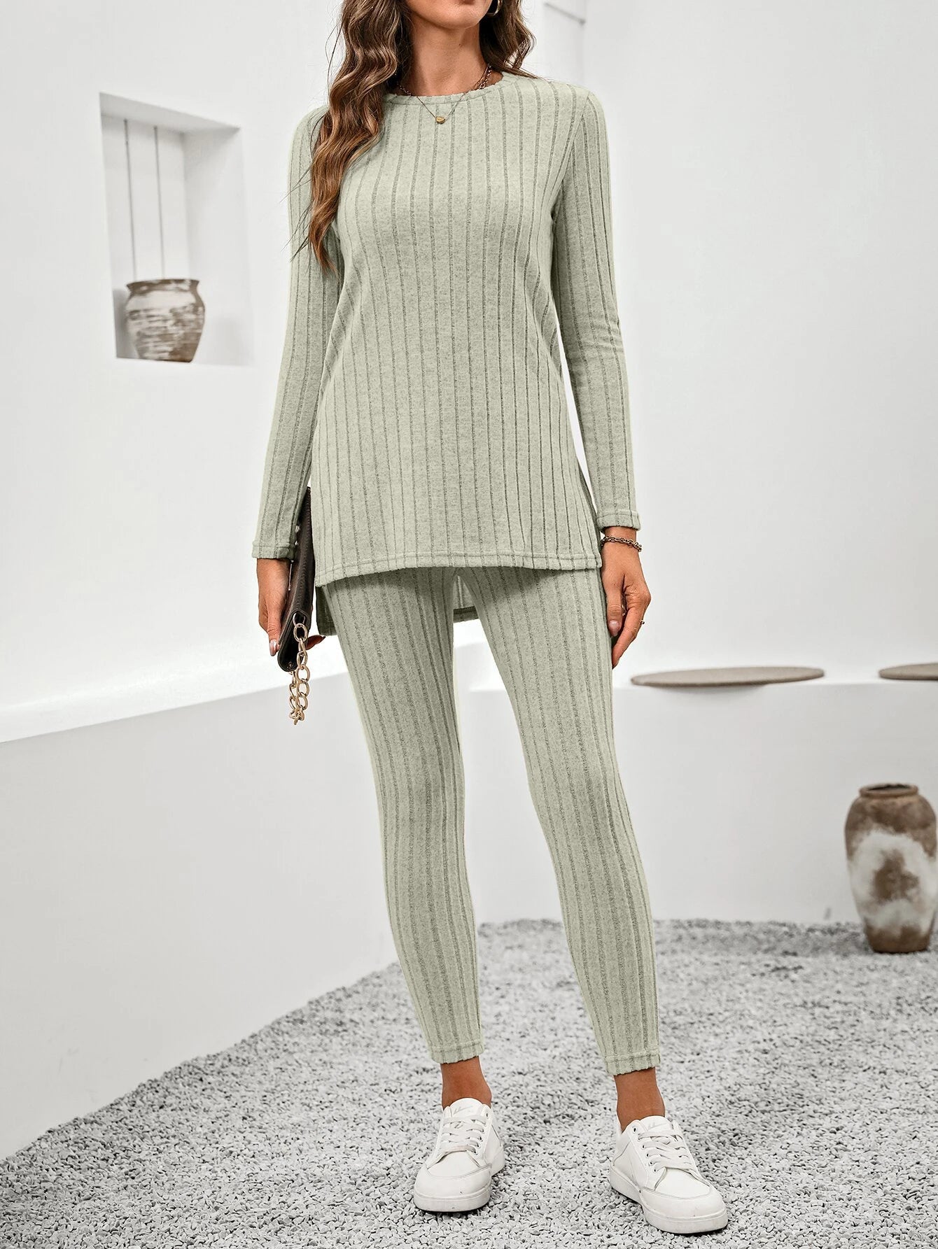 Women's ribbed knit lounge set in soft neutral tones, tunic top and leggings two-piece cozy outfit