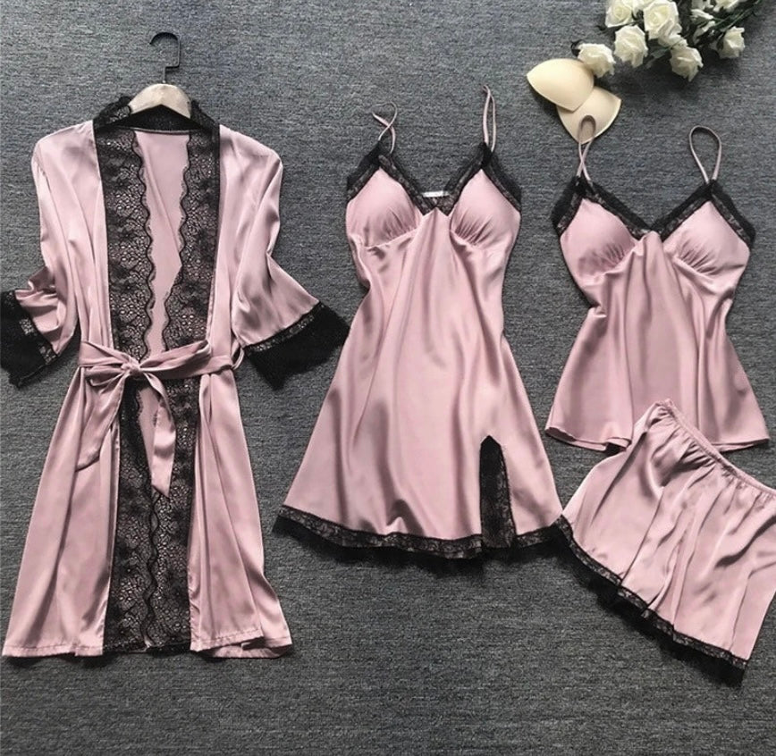 Women's luxury satin pajama set in soft neutral tones, elegant relaxed fit with refined silhouette