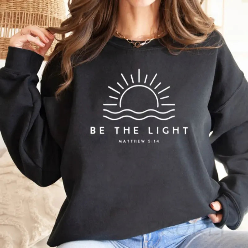 Women's white minimalist faith sweatshirt with Matthew 5:14 inspirational verse print pullover
