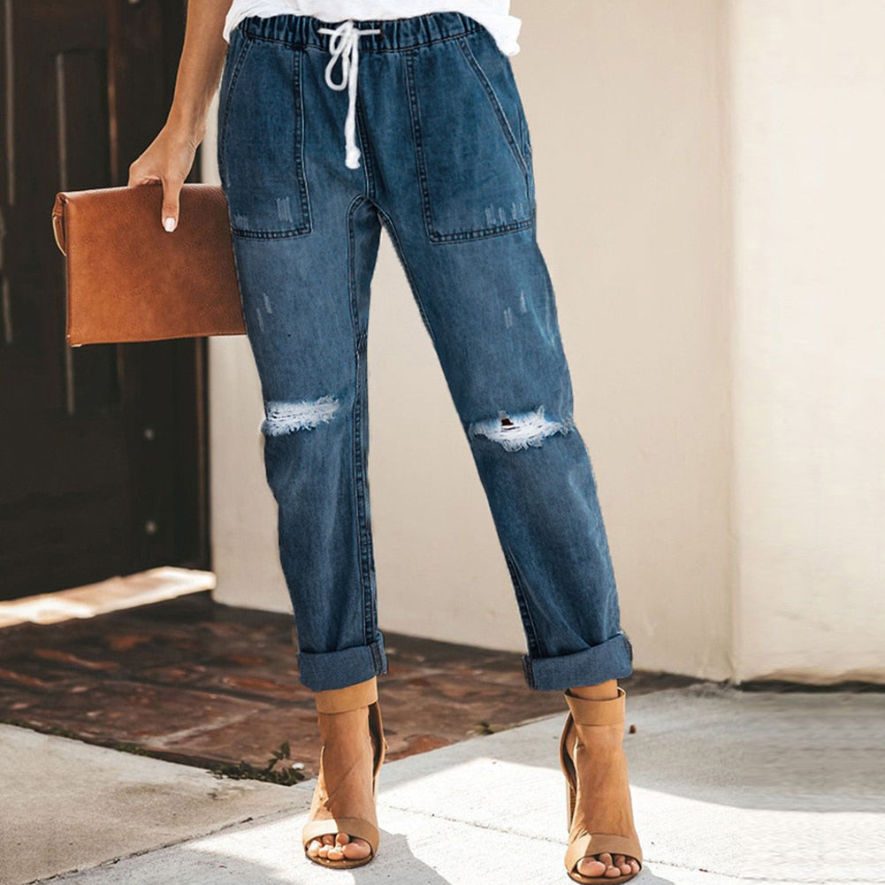 Women's relaxed-fit elastic waistband pants in neutral tone, casual everyday style with polished look