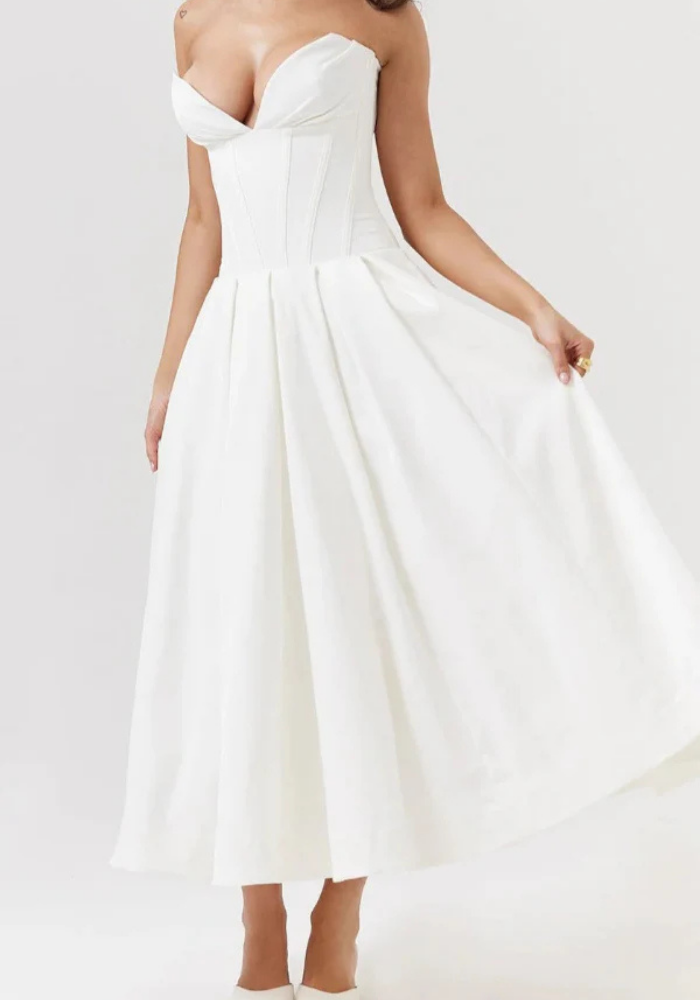 Women's strapless midi evening gown with structured corset bodice, flowing skirt, timeless elegant formal style