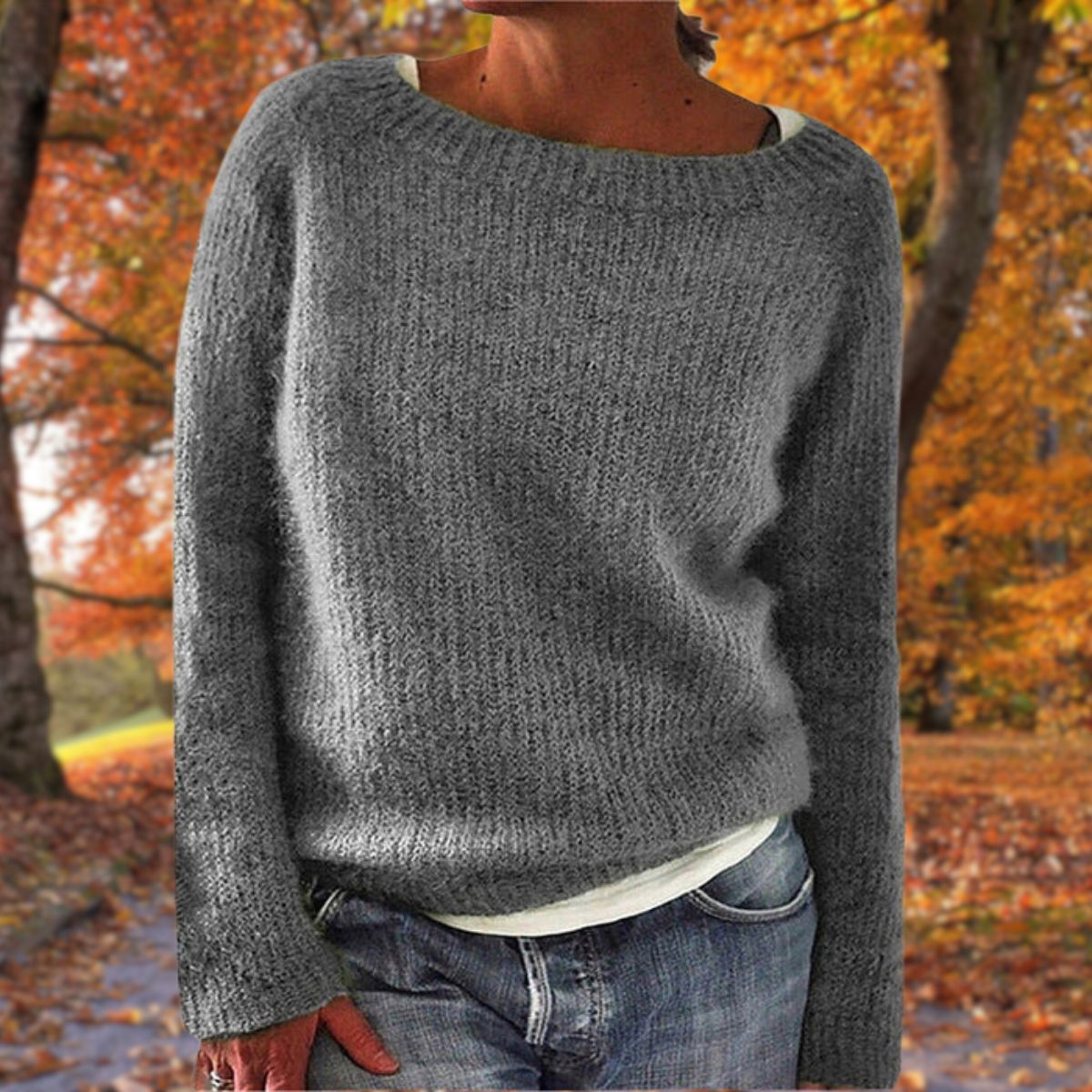Women's textured knit relaxed fit sweater in neutral tone, cozy layering style with soft tactile finish