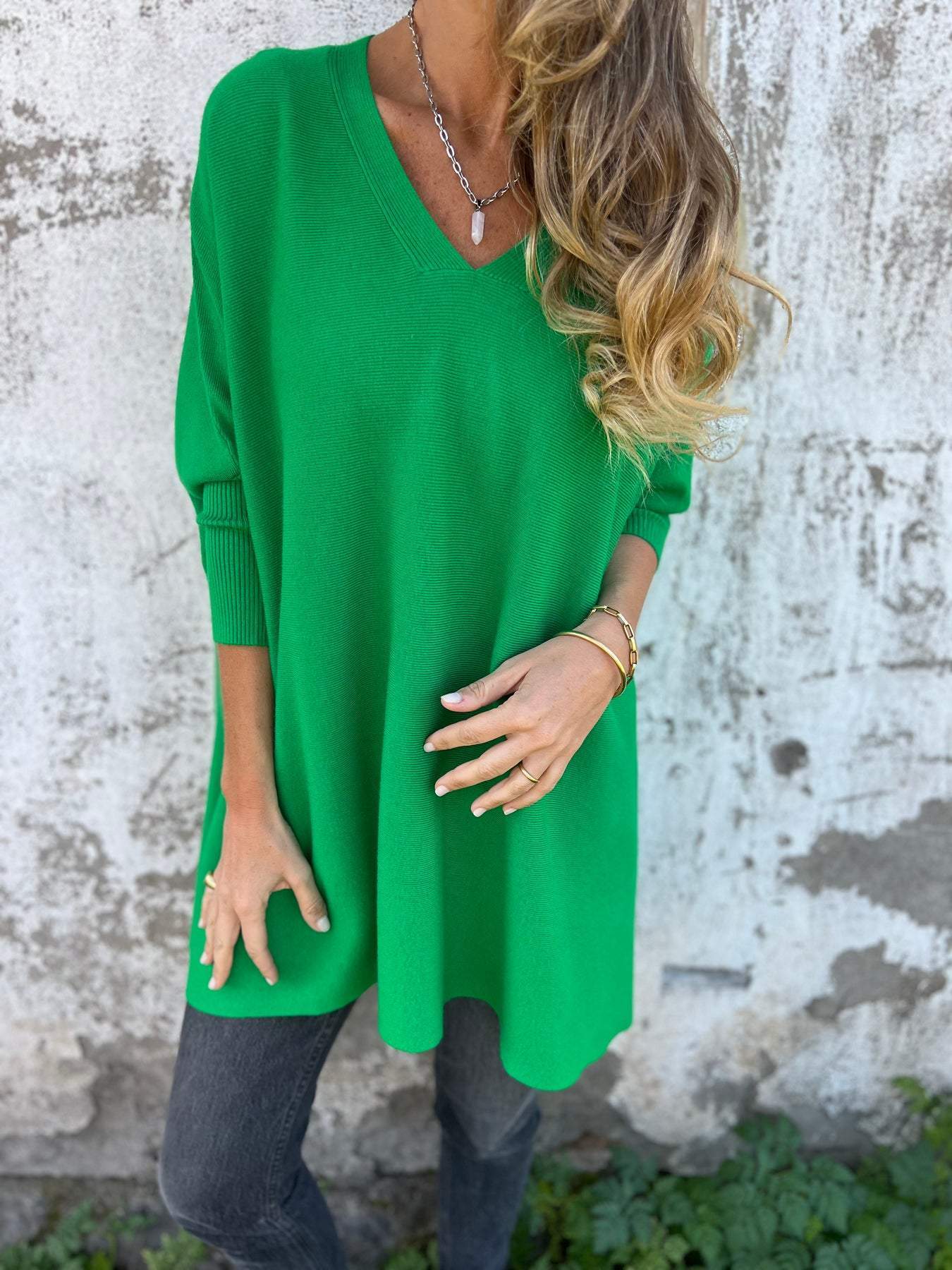 Women's relaxed V-neck winter sweater in soft knit with modern silhouette and flattering open neckline