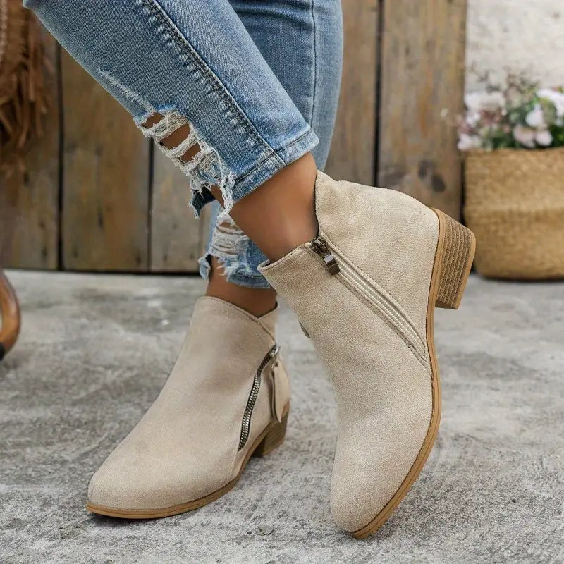 Women's knee-high boots with side zipper, elegant silhouette in versatile colors for everyday chic