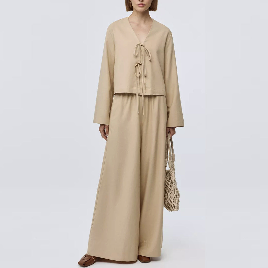 Women's wide-leg pants set with tie-top, minimalist two-piece office outfit in neutral tones