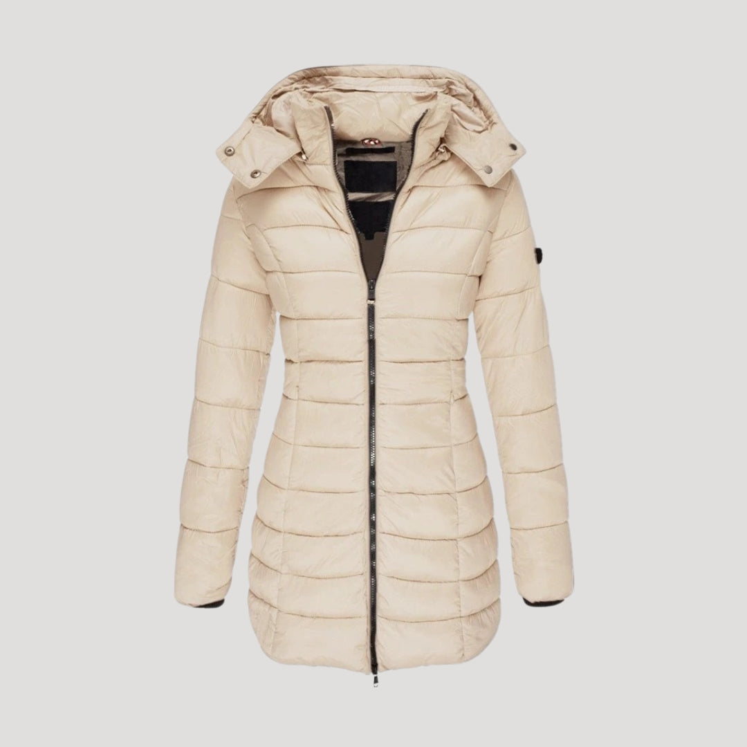 Women's long hooded puffer coat in neutral tone, insulated winter outerwear with sleek elongated silhouette