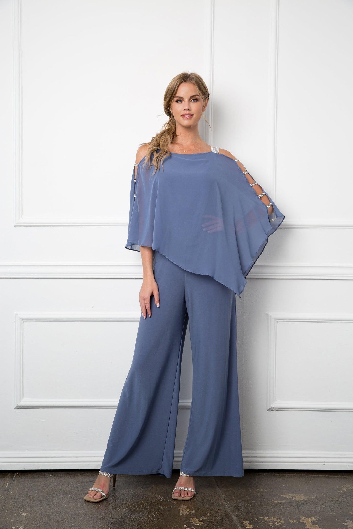 Black formal jumpsuit with chiffon cape overlay, sleek stretch jersey fit for elegant ceremonies
