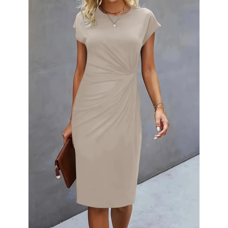 Women's black ruched bodycon dress with cap sleeves, flattering side ruching and stretch-fit silhouette