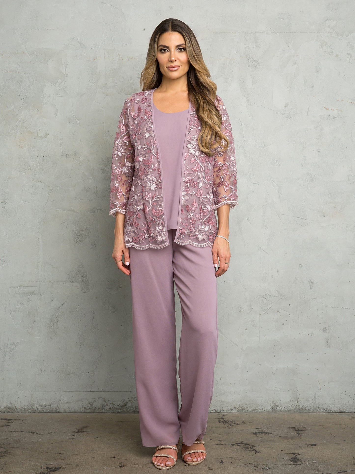 Women's three-piece floral lace jacket pant suit in formal style with jersey top and matching pants