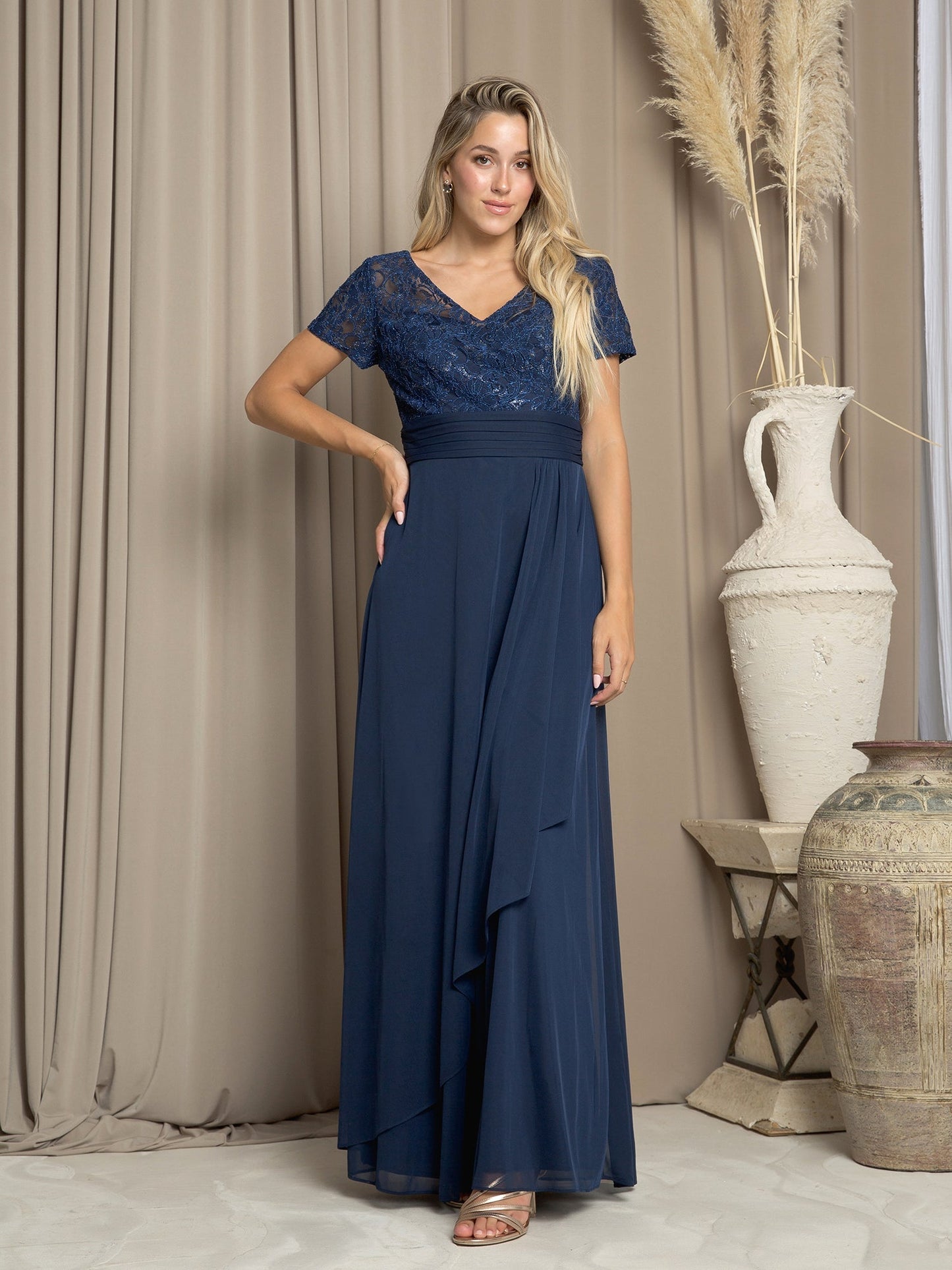 Long A-line mother of the bride dress in chiffon and lace with sequin bodice and flowing wrap skirt