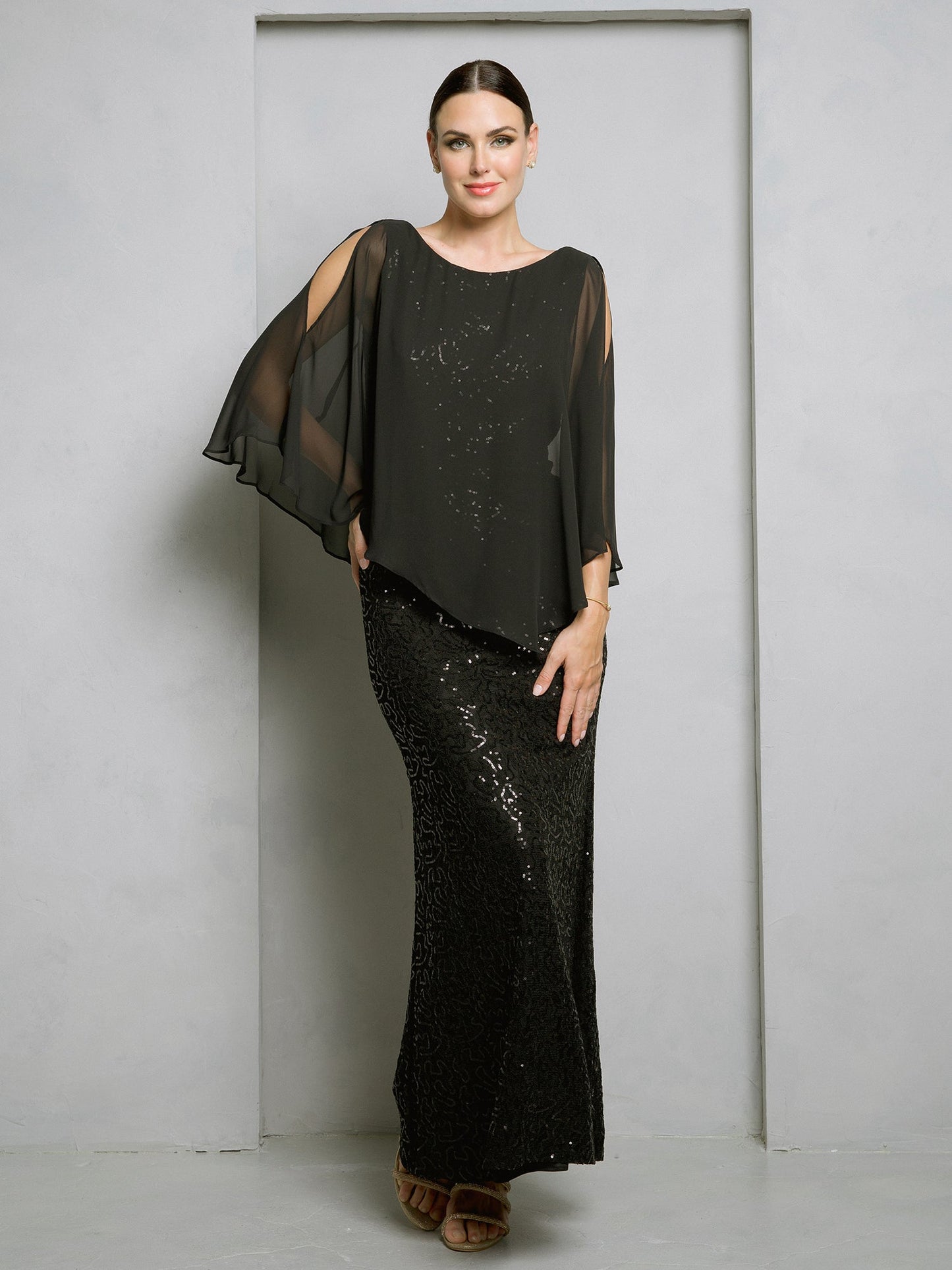 Floor-length mother of the bride gown with sparkling sequin lace and flowing chiffon cape overlay