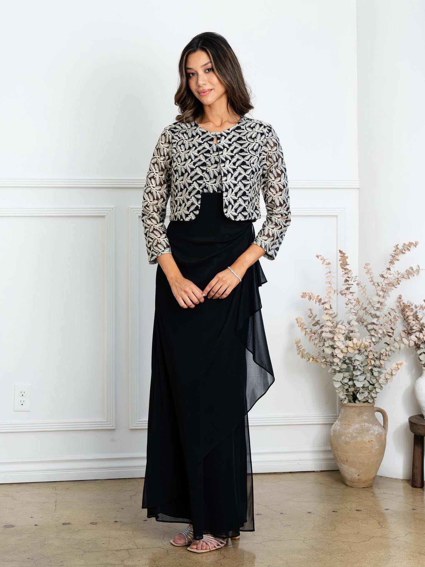 Long formal mother of bride dress with lace bolero jacket and elegant wrap-style chiffon skirt