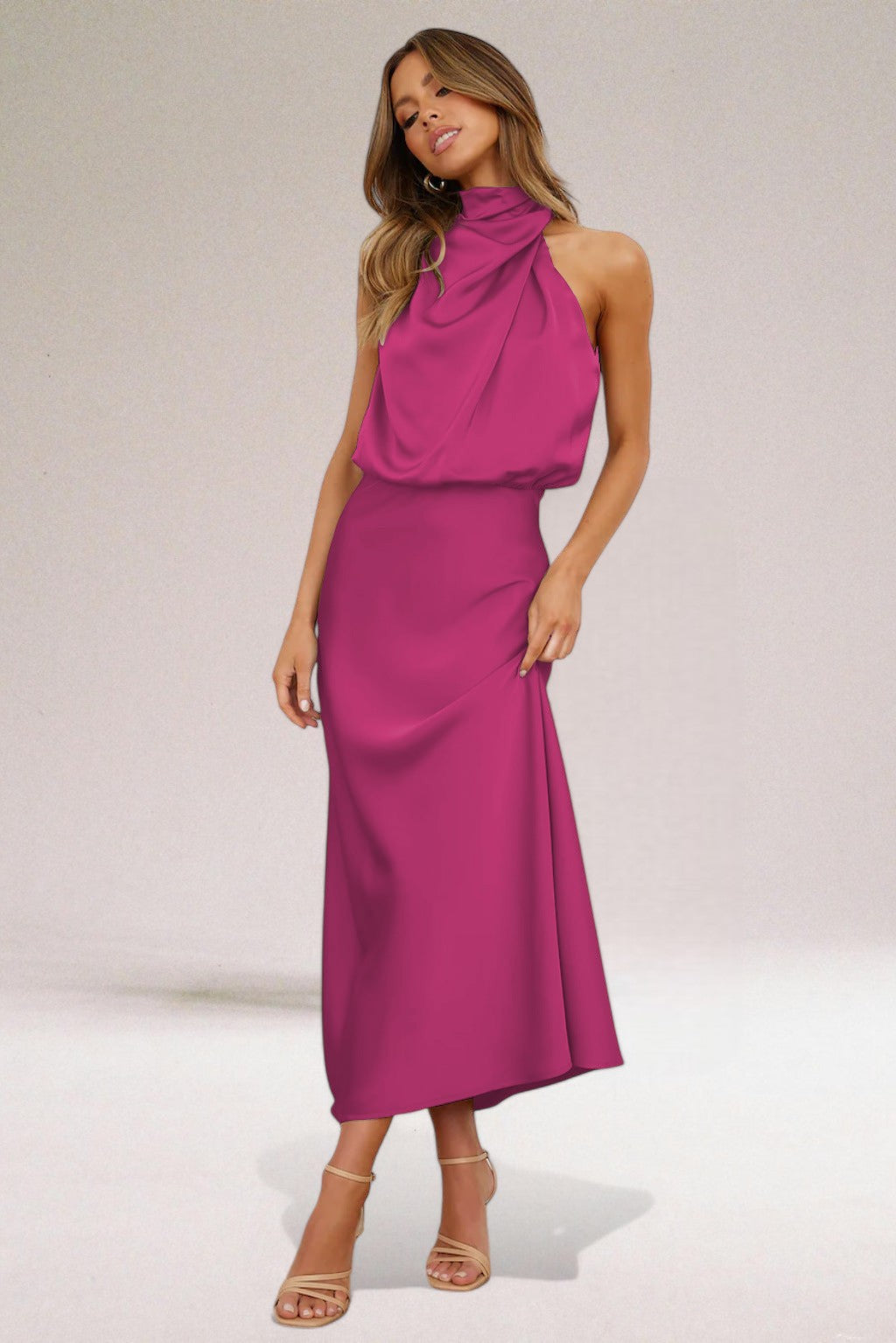 Women's ivory satin halter dress with elegant figure-flattering silhouette and luxurious subtle sheen