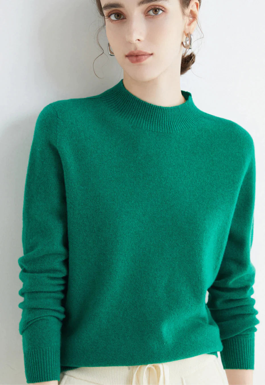 Women's elegant knit sweater soft luxurious fabric classic flattering cut for casual and polished occasions