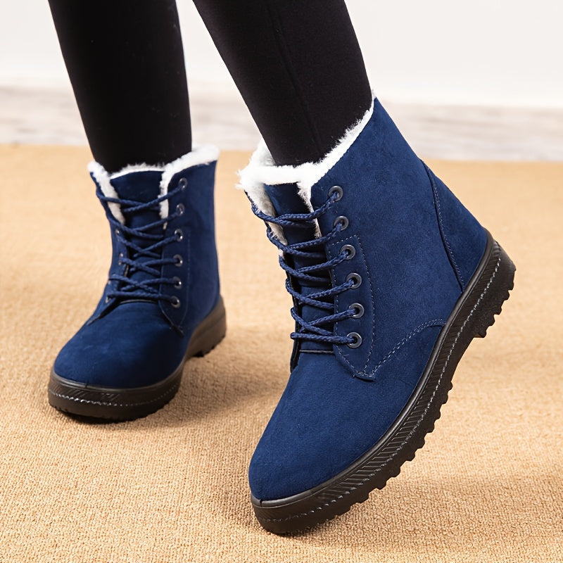 Women's ankle-high winter boots with lace closure, fleece lining, and profiled sole for cold weather