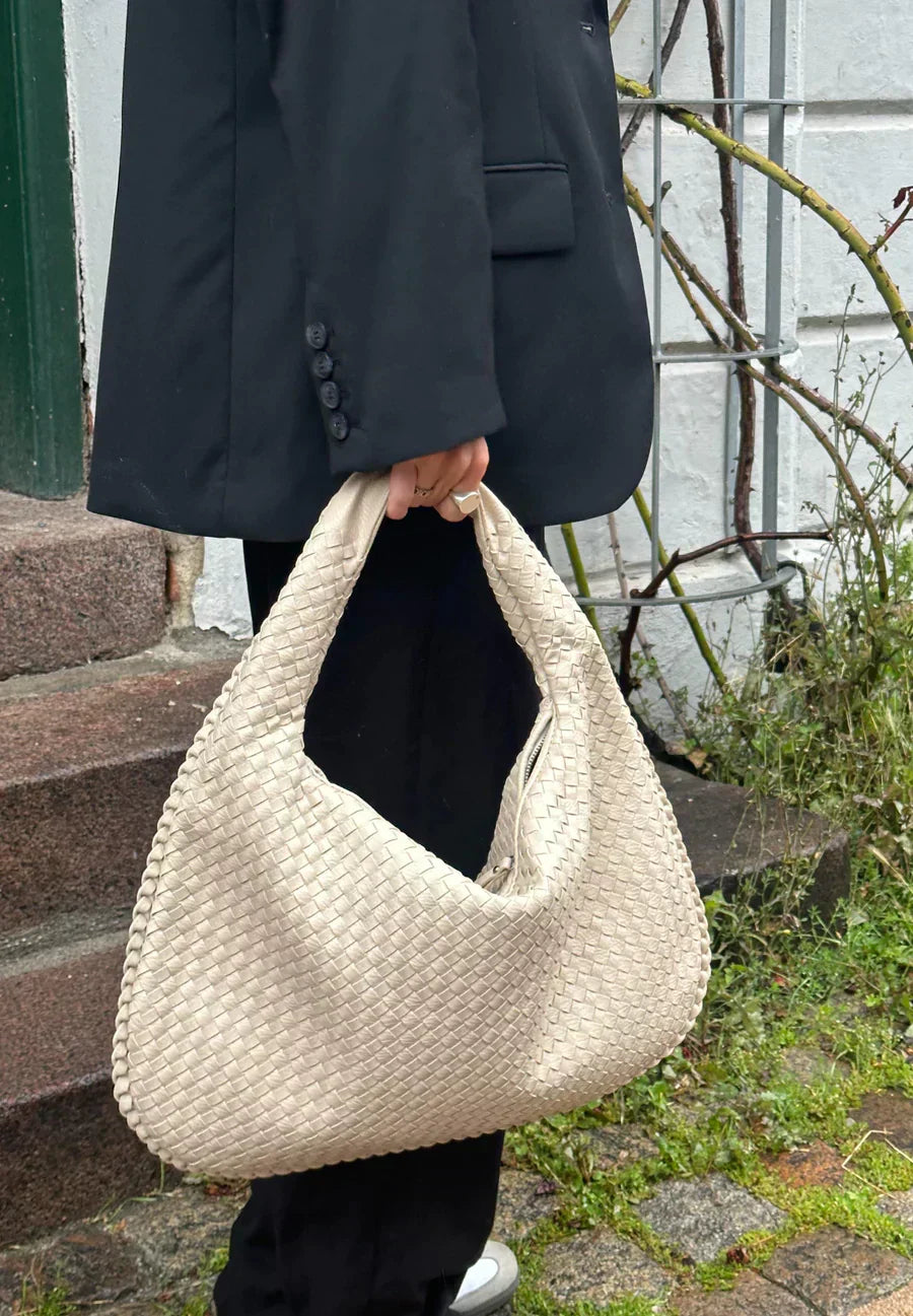 Women's woven braided vegan leather round shoulder handbag in neutral tone fits 13" MacBook