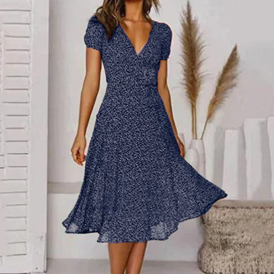 Women's black A-line dress with V-neck and flared hem, chic easy-care silhouette