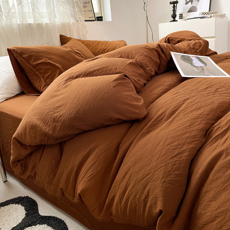 Washed cotton bedding set in neutral tones, minimalist style with pre-softened lived-in texture