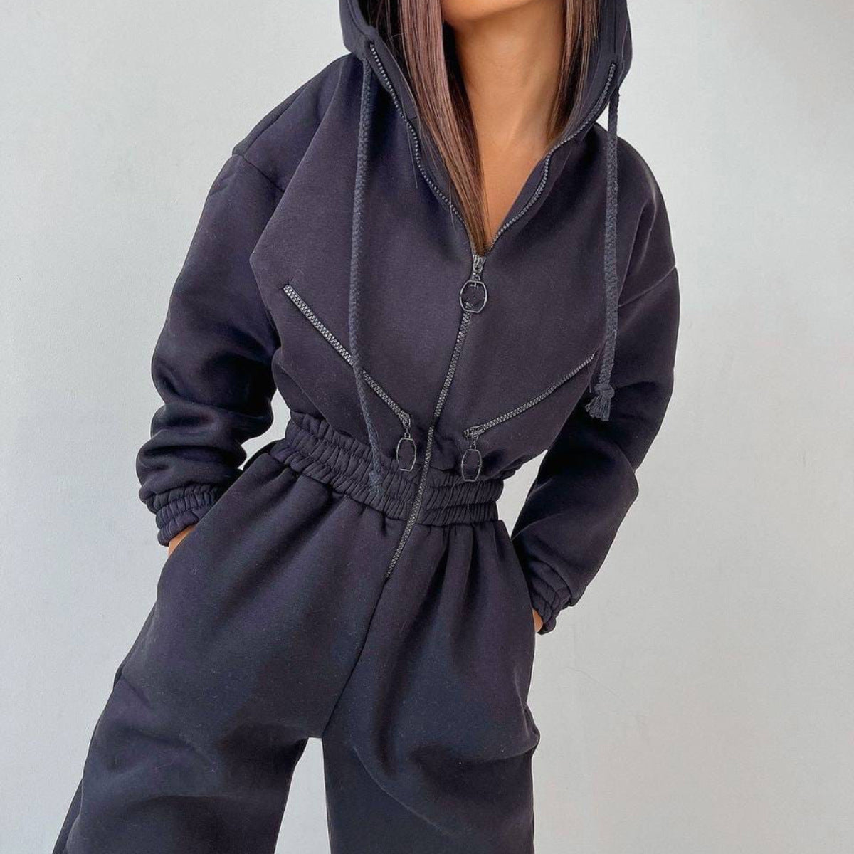 Heather gray heavyweight fleece zip-up jumpsuit with cinched waist and adjustable hood