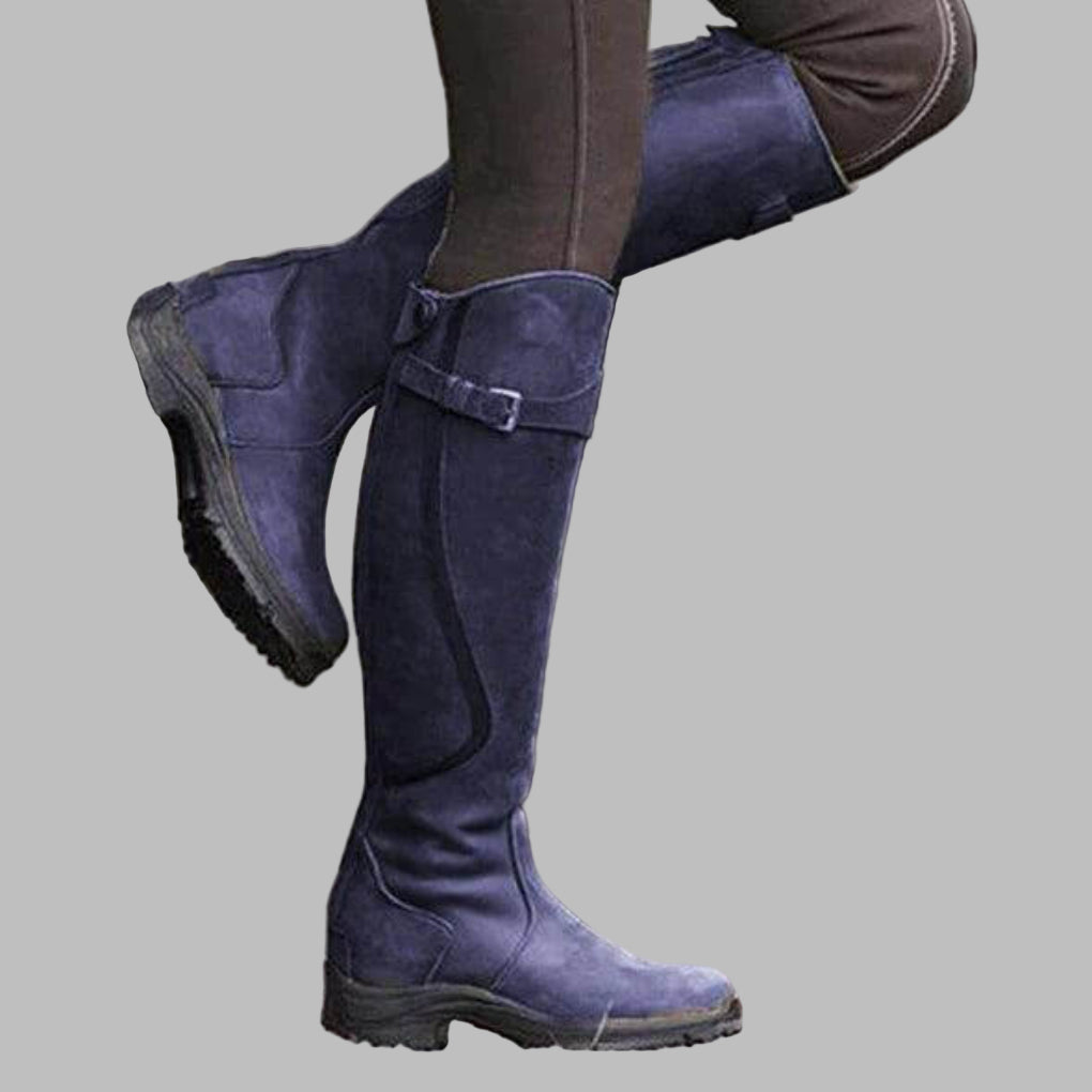 Women's brown leather hiking boots with adjustable strap, trail-ready durable outdoor footwear