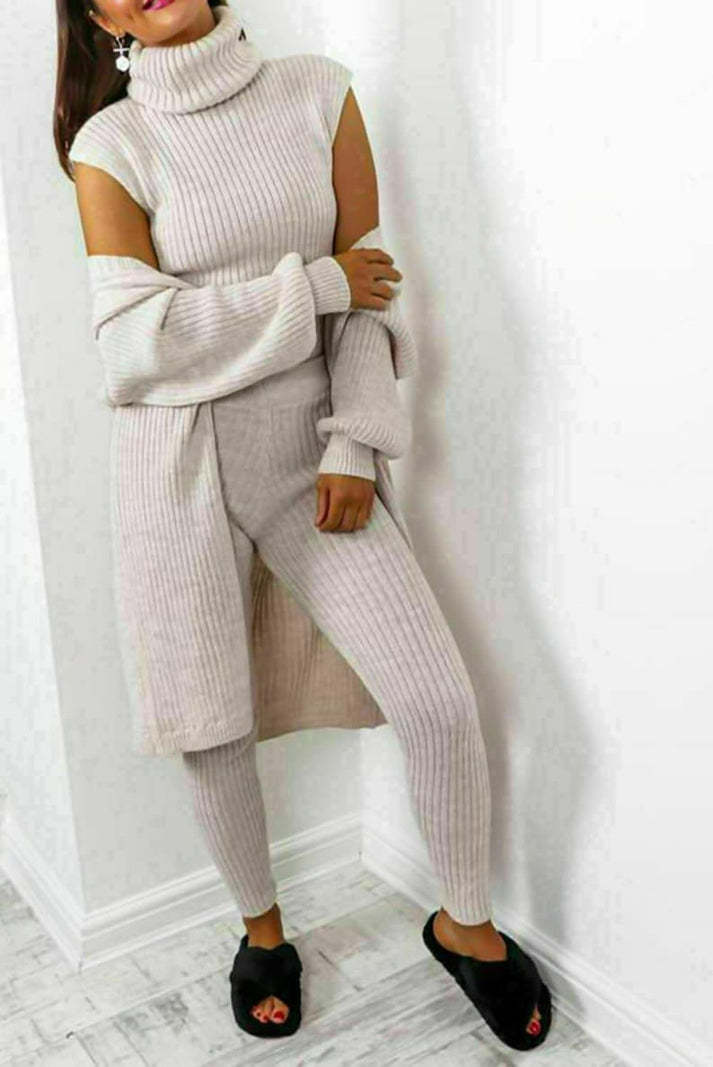 Women's 3-piece knit loungewear set with turtleneck sweater, chunky knit top, and matching pants