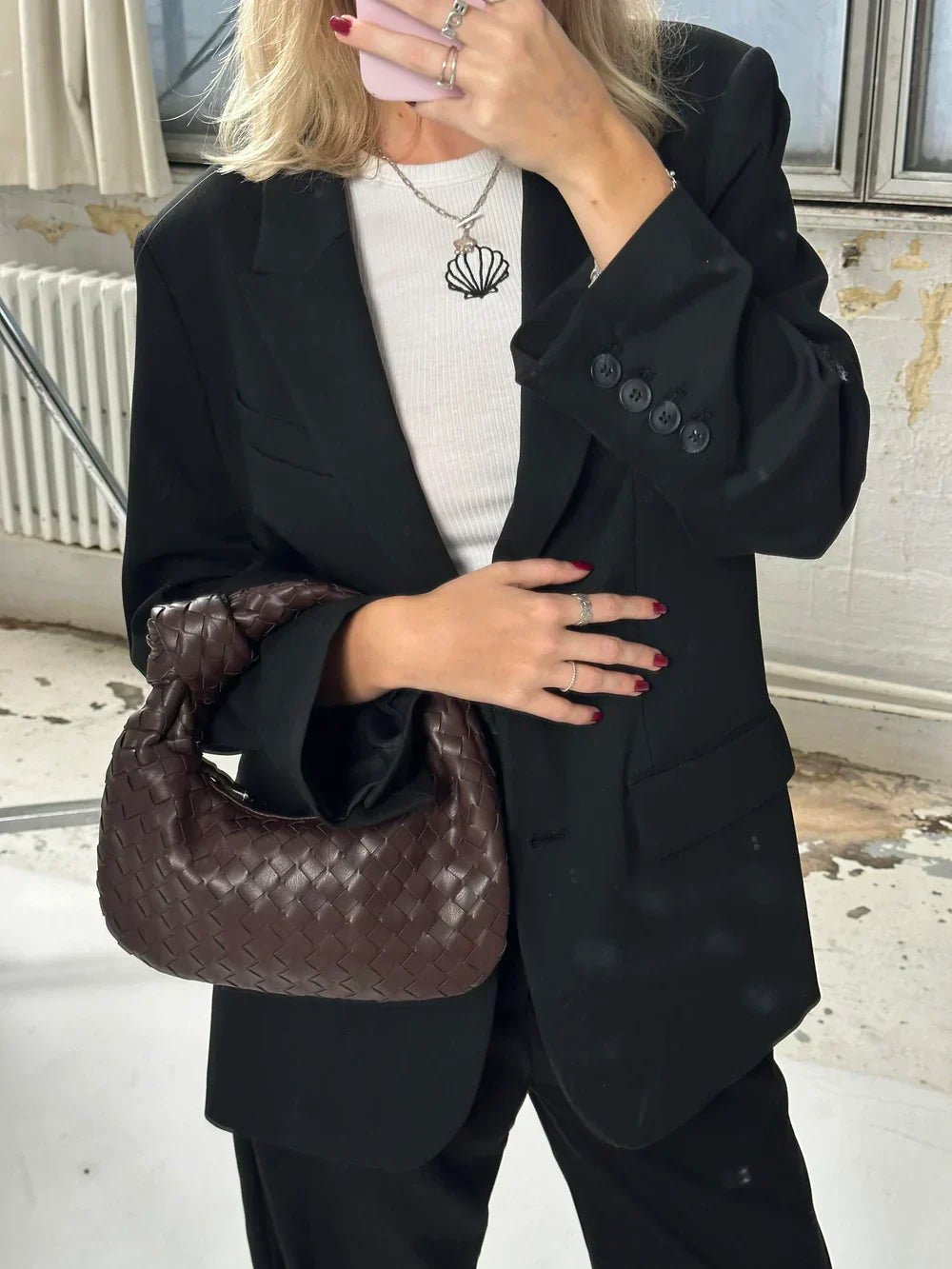 Woven women shoulder bag with knotted handle, spacious interior, versatile chic everyday style