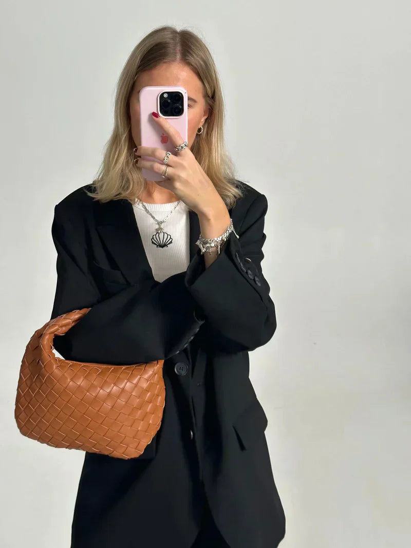 Women's woven shoulder bag with knotted handle, spacious interior, versatile chic everyday style