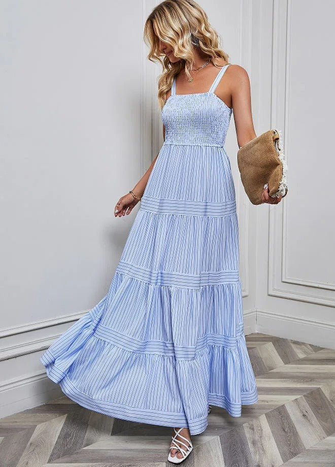 Elegant women's maxi dress smocked bodice flowy A-line silhouette lightweight summer style