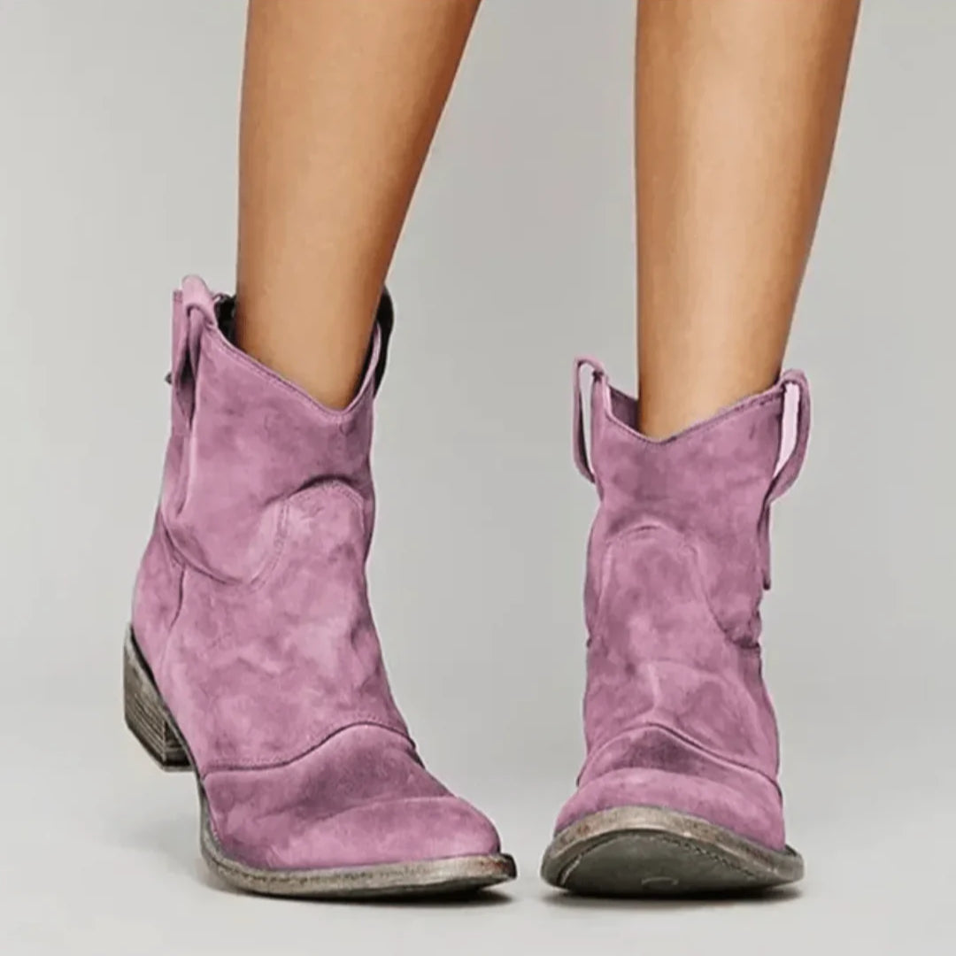 Women's brown suede western curve boots with low heel and sculpted silhouette for city style
