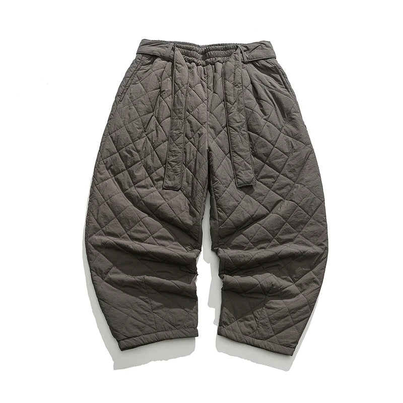 Gray wide-leg fleece patch pants with quilted texture and bold oversized pockets for streetwear
