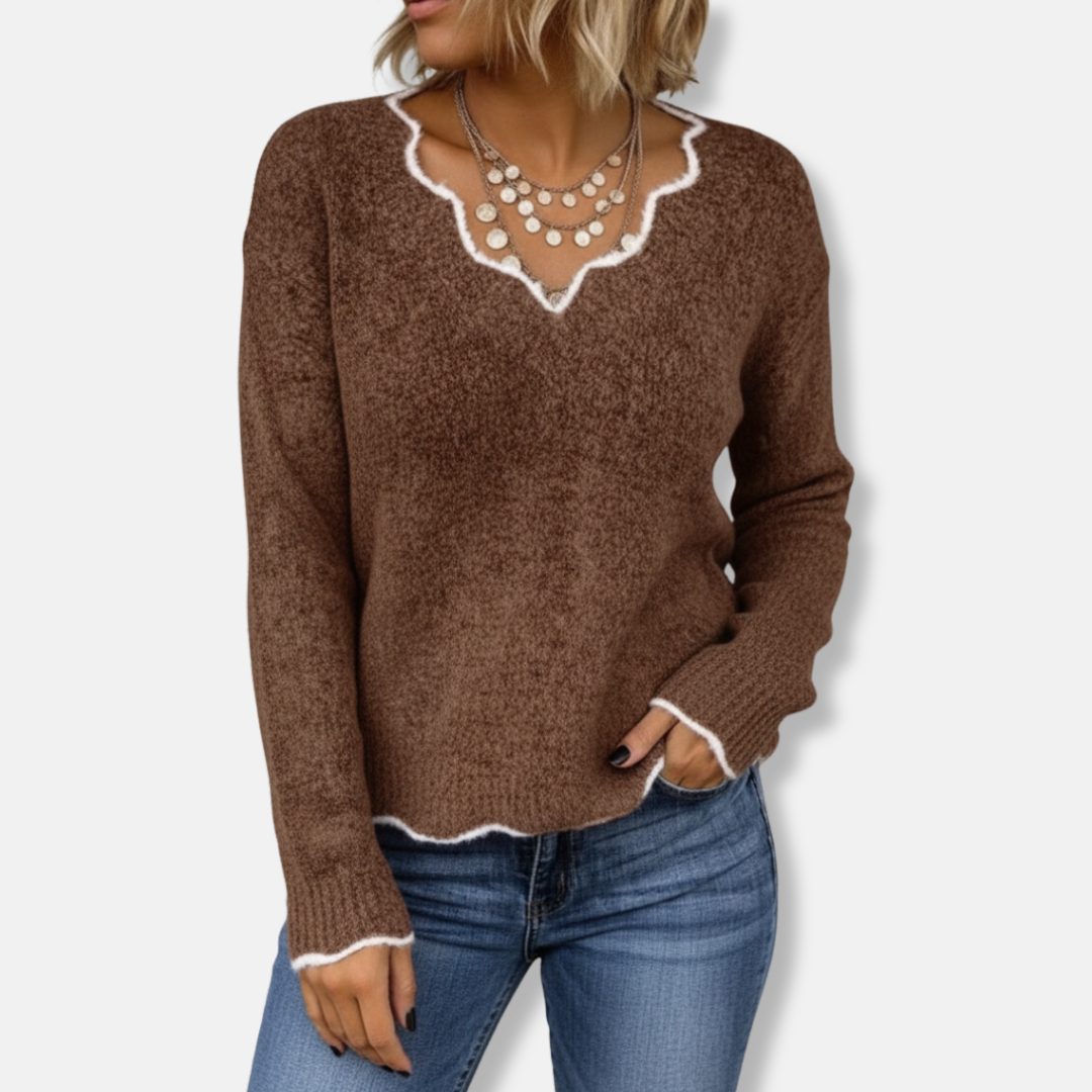 Women's relaxed-fit wool knit pullover sweater with soft texture and feminine scalloped neckline