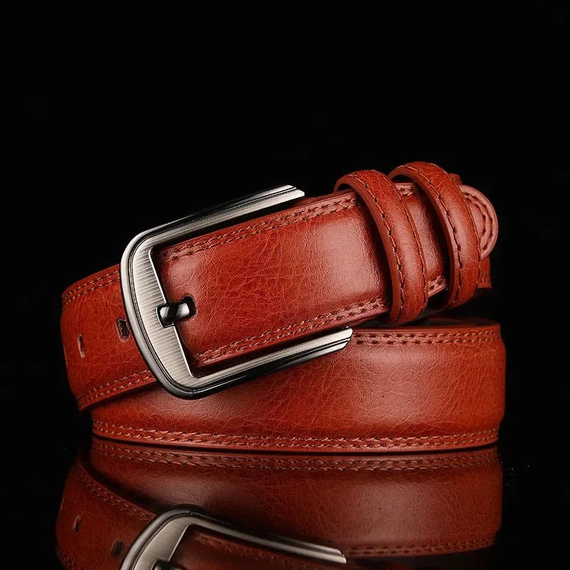 Men's full-grain leather belt hand-finished with precision milled buckle, rich patina, timeless style