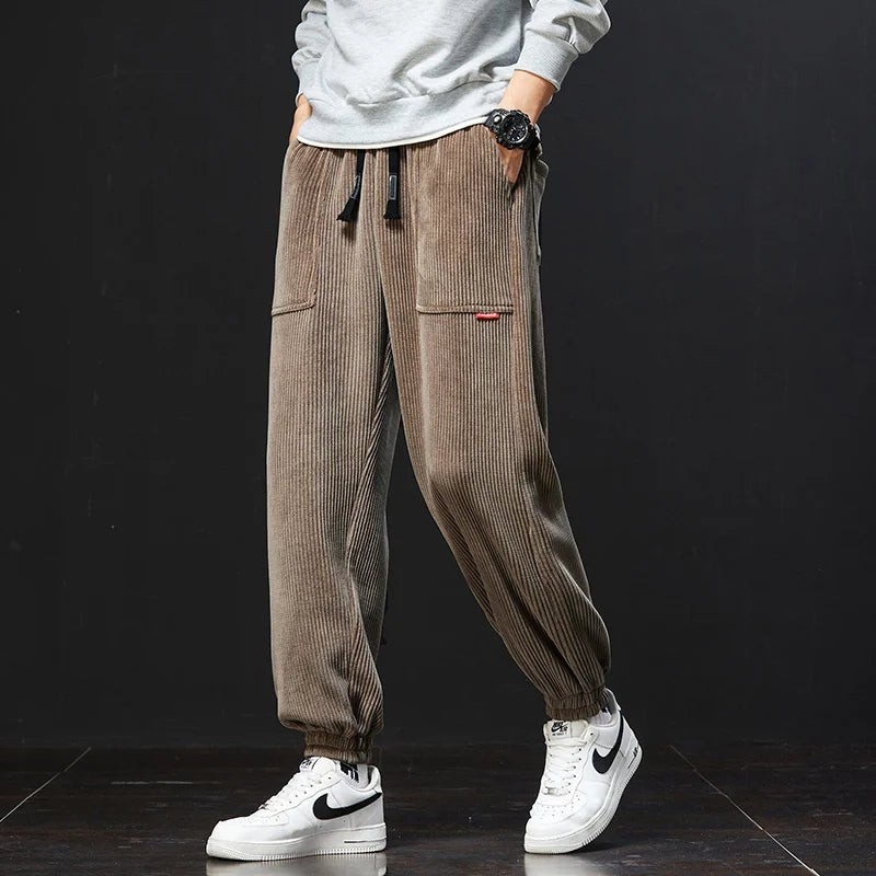 Women's olive green corduroy jogger pants relaxed fit with stretch fabric and colorfast finish