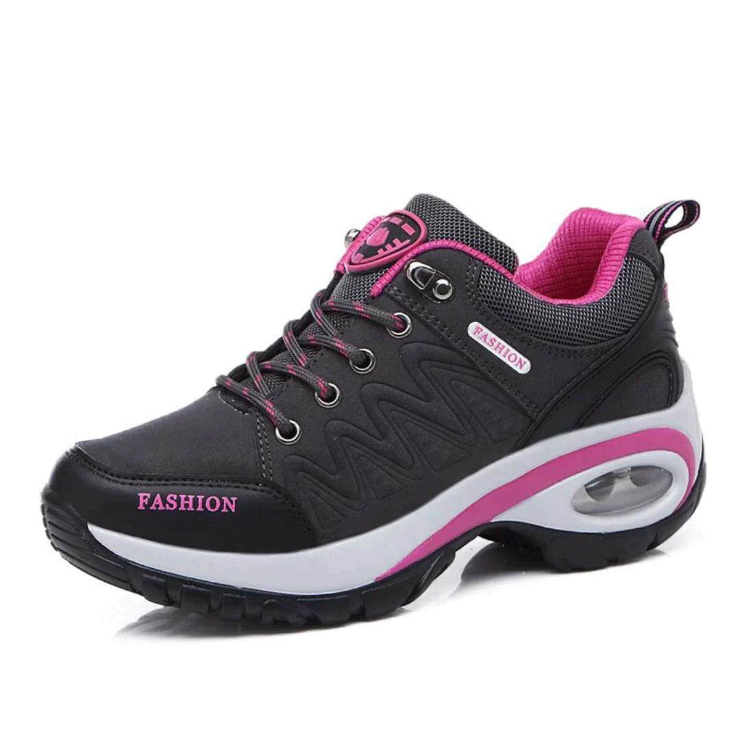 Women's Poly hiking shoes in pink synthetic leather with modern silhouette and all-day comfort support