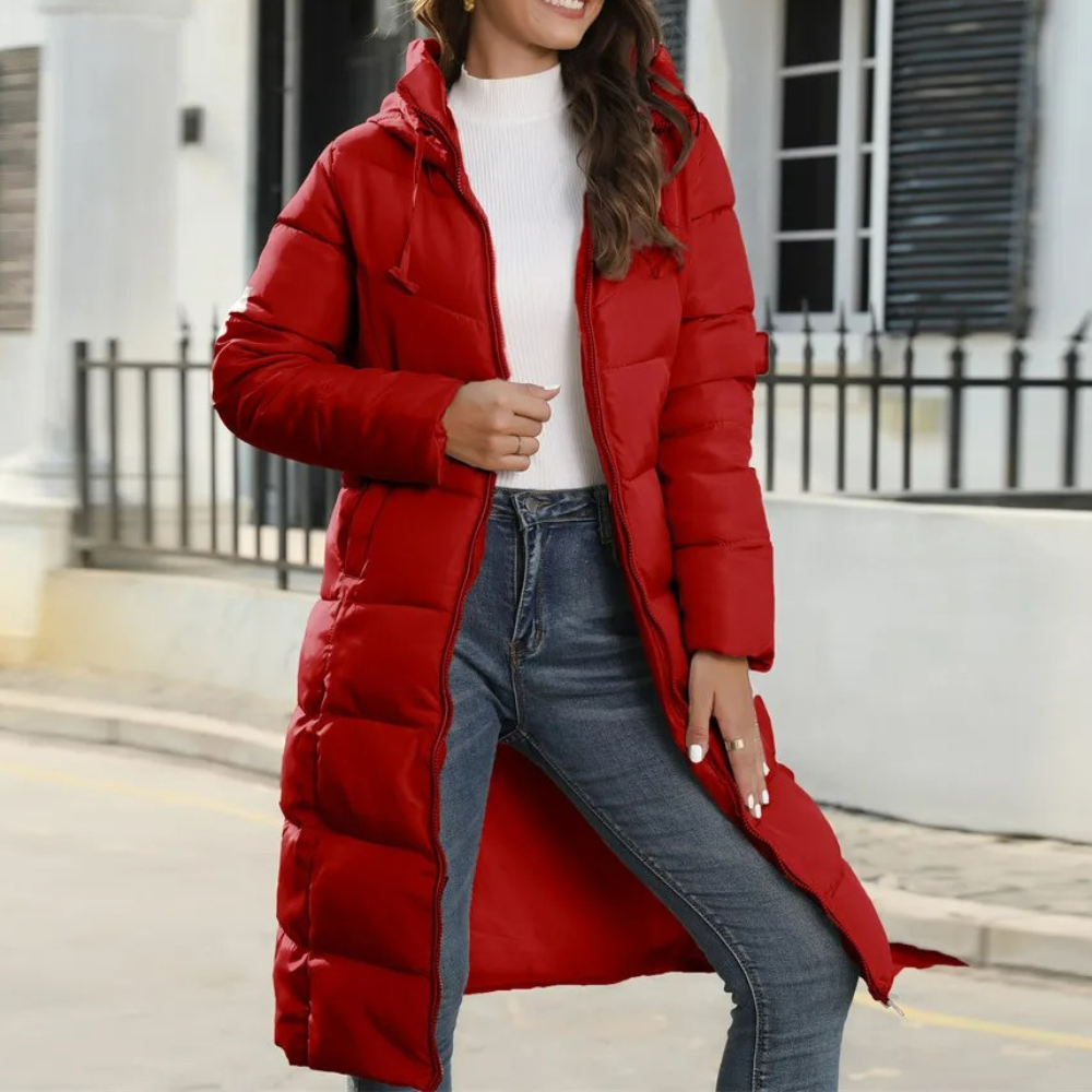 Women's long hooded puffer coat in modern city style with wind-resistant design for ultimate warmth
