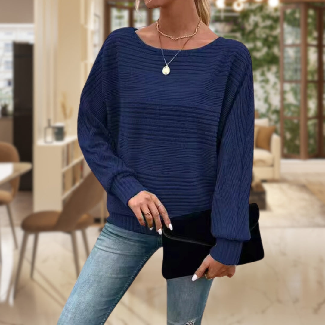 Women's cozy wool pullover sweater in modern knit design, flattering cut for everyday warmth