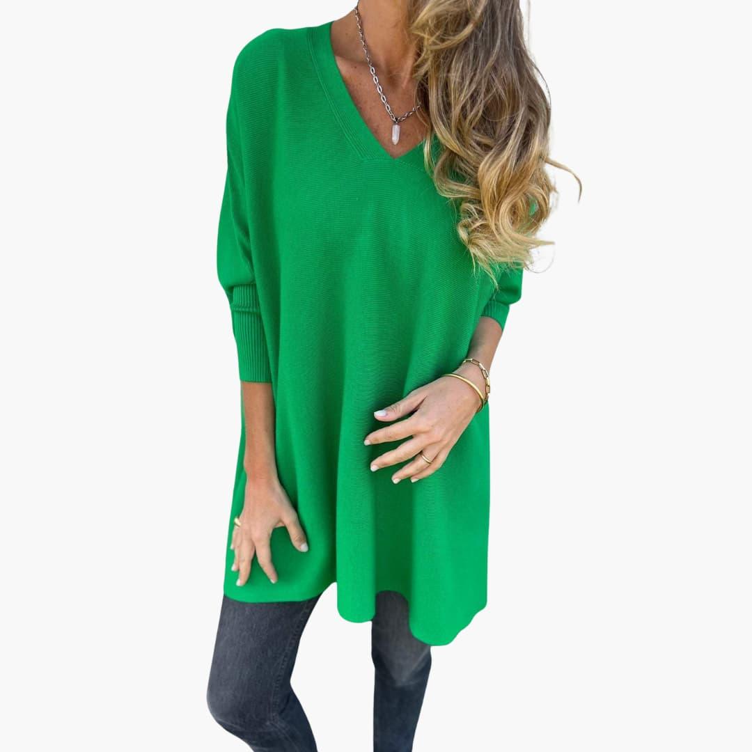 Women's loose-fit V-neck knit sweater in neutral tone, relaxed silhouette with flattering neckline