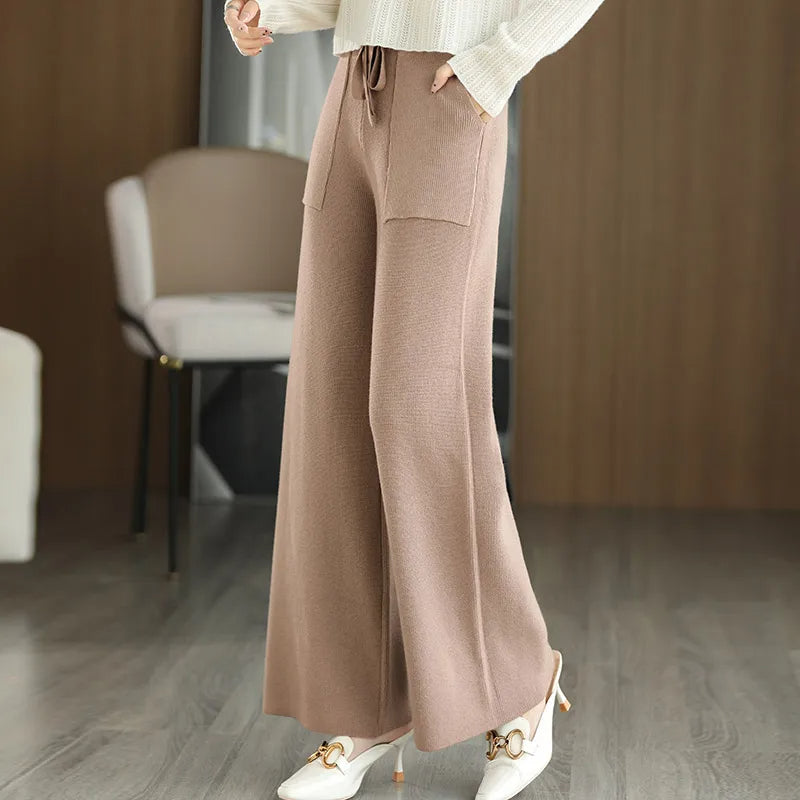 Monaco wide-leg wool pants in neutral tone, relaxed silhouette with breathable 100% premium wool fabric