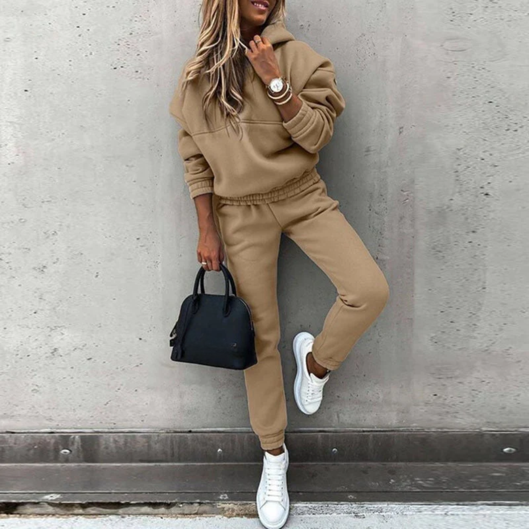 Women's stretch fit hoodie and joggers matching set in chic athleisure style with relaxed silhouette