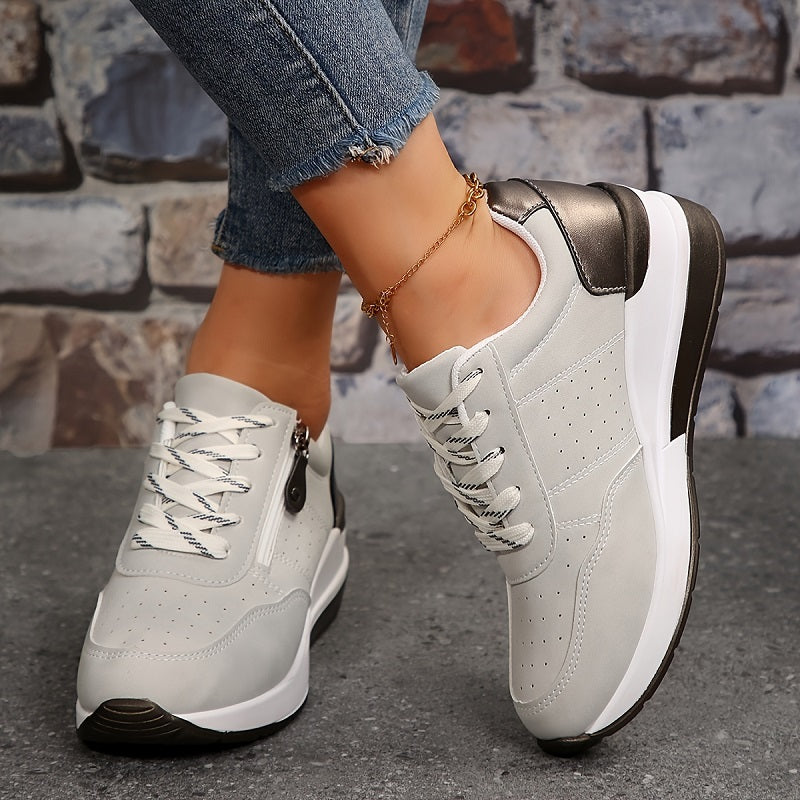 White urban comfort sneakers with sleek sporty silhouette and cushioned sole for all-day support