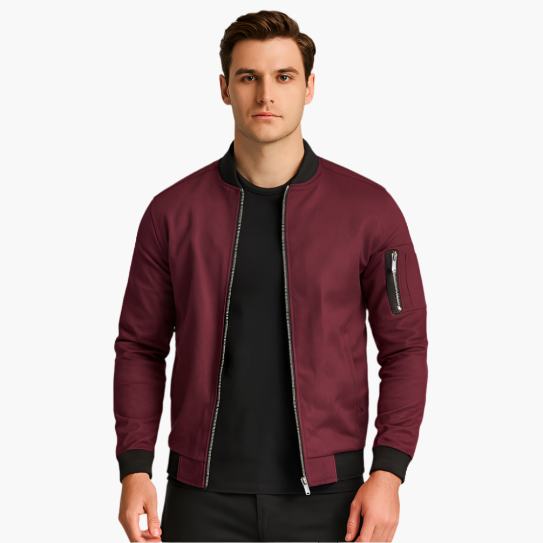 Men's black bomber jacket with ribbed hem, cuffs, collar, and zip arm pocket for casual wear