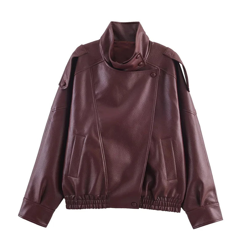 Women's black high-gloss vegan leather moto jacket with sculpted funnel neck and architectural silhouette