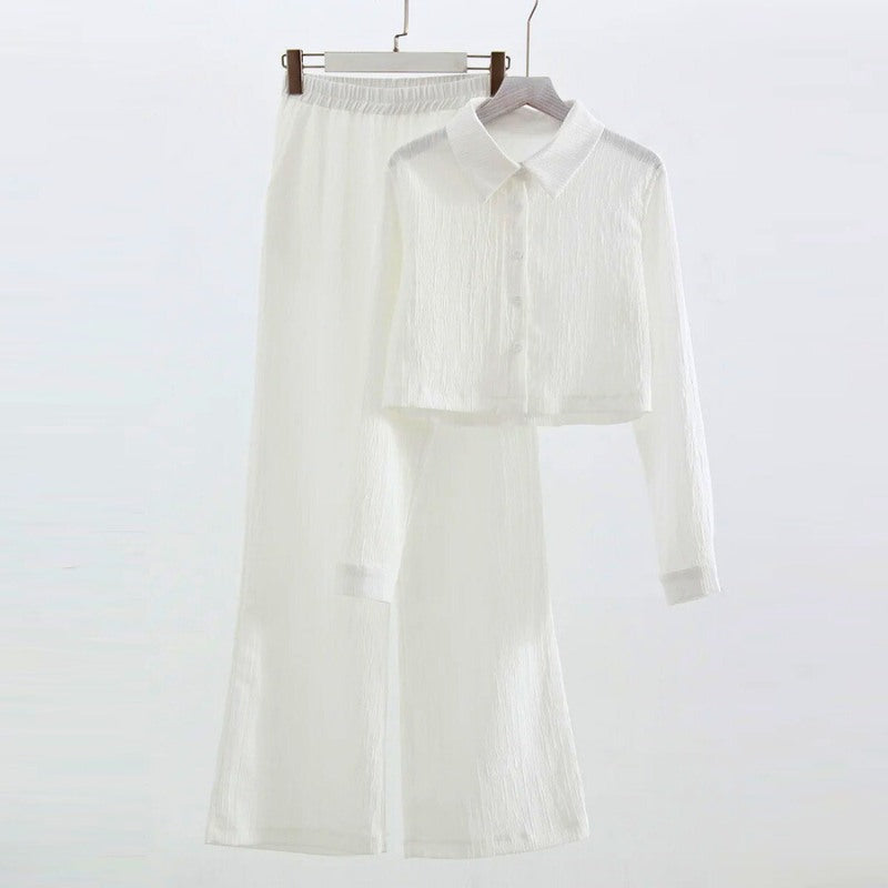 Women's elegant two-piece set in versatile tones with elastic waistband, perfect for formal or beach