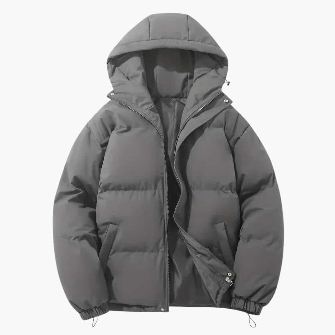 Women's quilted hooded jacket with full zipper, side pockets, and adjustable hem drawstring
