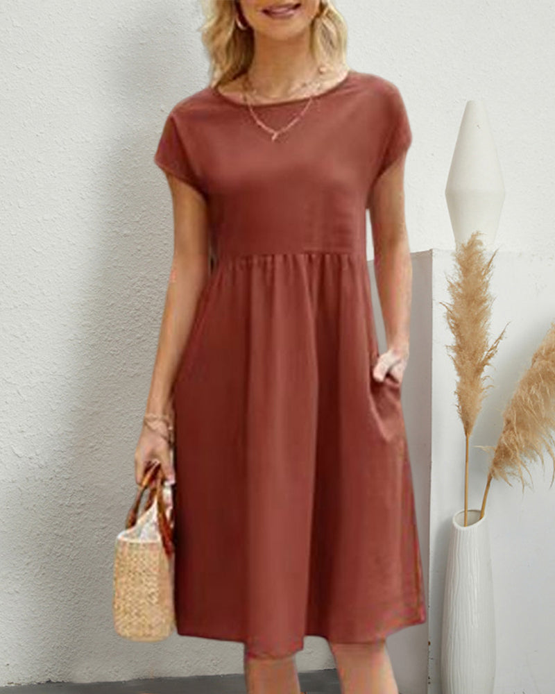 Women's round neck midi dress with pockets, versatile everyday style in polished silhouette