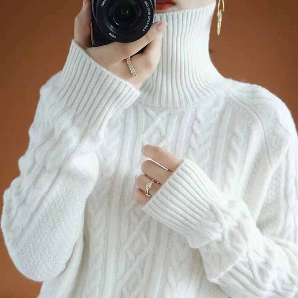 Women's loose-fit turtleneck sweater in premium soft knit with elegant classic silhouette