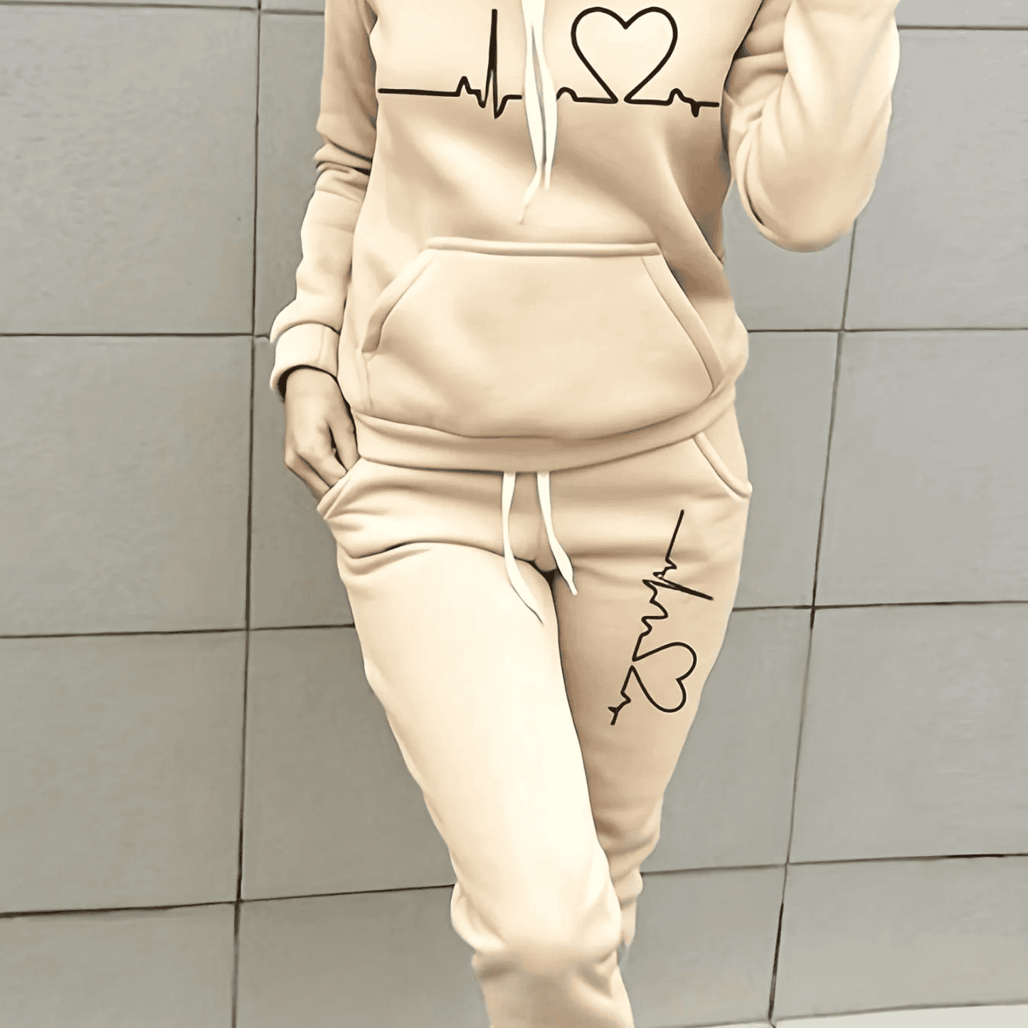 Women's pink heart print matching sweat set with soft hoodie and joggers for cozy lounge comfort