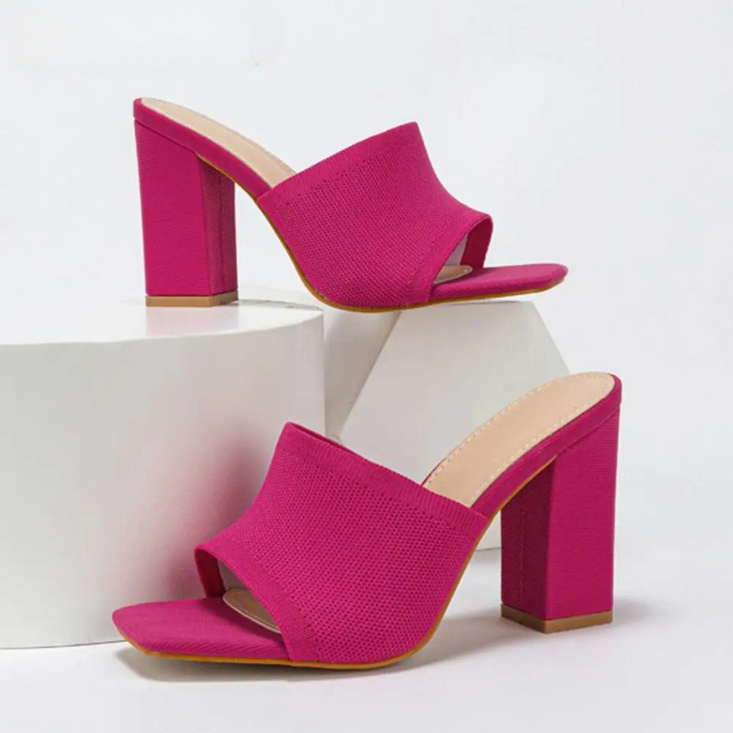 Neon stretch ribbed knit platform mule heel in bold colors with sky-high block heel