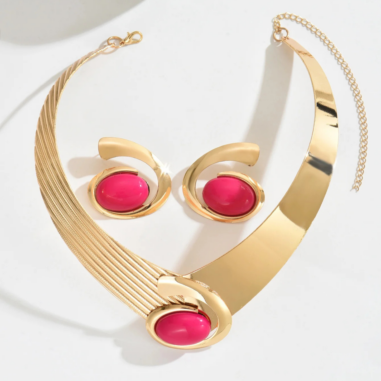 Cirelle opal asymmetrical gold-tone statement necklace and earrings set with mirror-finish sculptural design