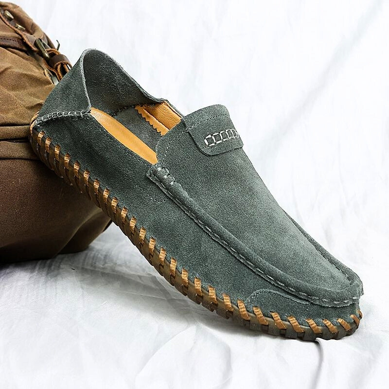 Men's tan suede slip-on loafers with hand-stitched detailing, flexible summer design for daily comfort